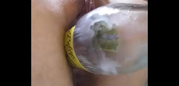  Sexy size queen slut fucks her huge pussy hole with a juice bottle